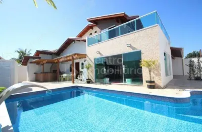Casa à venda com piscina e 4 quartos em peruíbe, no bairro jardim três marias