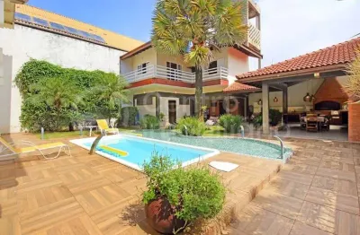 Casa à venda com piscina e 4 quartos em peruíbe, no bairro balneario florida