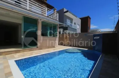 Casa à venda com piscina e 4 quartos em peruíbe, no bairro bougainvillee iv