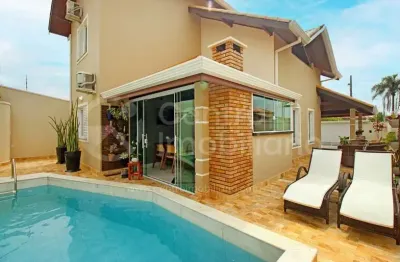 Casa à venda com piscina e 3 quartos em peruíbe, no bairro estancia sao jose