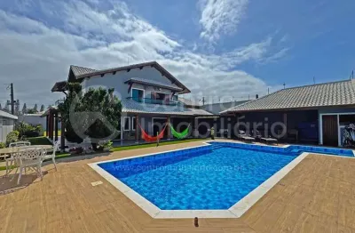 Casa à venda com piscina e 4 quartos em peruíbe, no bairro parque turistico