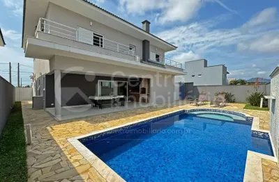 Casa à venda com piscina e 4 quartos em peruíbe, no bairro bougainvillee iv