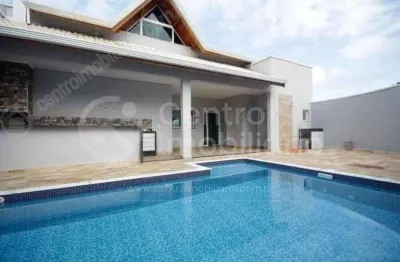 Casa à venda com piscina e 3 quartos em peruíbe, no bairro estancia sao jose