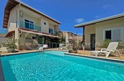 Casa à venda com piscina e 4 quartos em peruíbe, no bairro maria h novaes