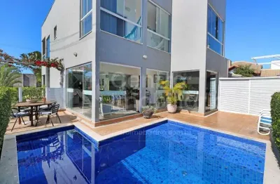 Casa à venda com piscina e 4 quartos em peruíbe, no bairro jd tres marias