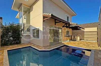 Casa à venda com piscina e 4 quartos em peruíbe, no bairro parque turistico