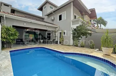 Casa à venda com piscina e 4 quartos em peruíbe, no bairro jardim imperador