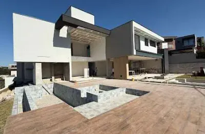 Casa com 5 dormitórios à venda, 720 m² por r$ 8.000.000,00 - condominio figueira garden - atibaia/sp