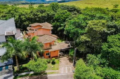 Casa com 5 dormitórios à venda, 636 m² por r$ 3.190.000,00 - condomínio figueira garden - atibaia/sp