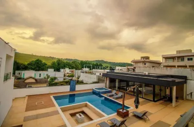 Casa com 6 dormitórios à venda, 800 m² por R$ 6.500.000,00 - Condomínio Figueira Garden - Atibaia/SP