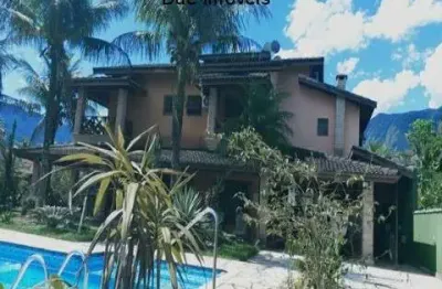 Casa de luxo em condomínio completo na morada da praia, bertioga-sp: 5 quartos, 4 suítes, 3 salas, 6 banheiros, 4 vagas.