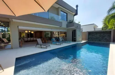 Casa com 6 dormitórios à venda, 429 m² por r$ 11.900.000,00 - riviera módulo 11 - bertioga/sp
