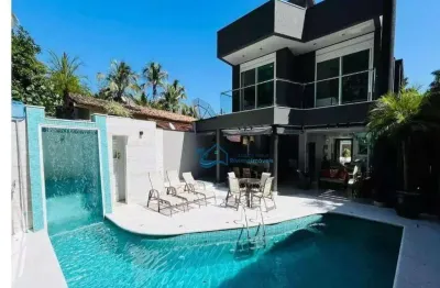 Casa com 5 dormitórios à venda, 459 m² por r$ 8.800.000,00 - riviera módulo 21 - bertioga/sp