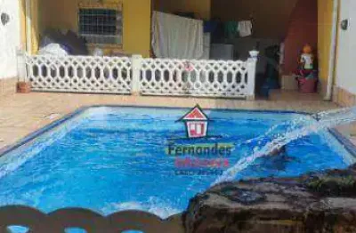 Casa térrea com piscina mais edícula , com 2 dormitórios à venda, 129 m² por r$ 720.000 - caiçara - praia grande/sp