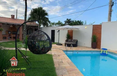 Casa isolada com piscina e espaço gourmet  3 dormitórios mais dependência à venda, 220 m² por r$ 1.300.000  balneário flórida  praia grande sp