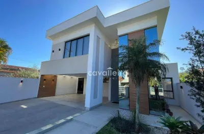 Casa magnífica no cond.elisa em maricá com 4 suítes, piscina, sauna, área gourmet e salão de jogos!