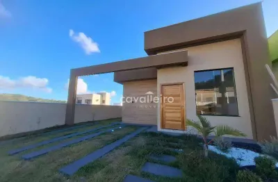 Casa com 03 quartos, sendo 01 suíte em condomínio próximo ao centro de maricá