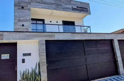 Casa com 2 dormitórios à venda, 51 m² por r$ 320.000,00 - vila guilhermina - praia grande/sp