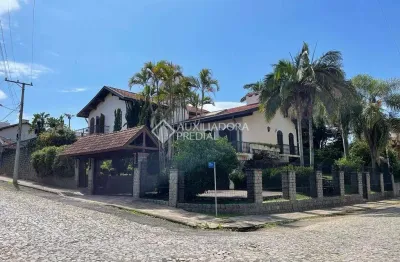 Casa com 5 quartos à venda na carlos hofstatter, 161, centro, montenegro, 623 m2 por r$ 1.998.000