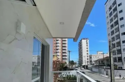 casa em condomínio sobreposta  alta com sacada no bairro Ocian.
