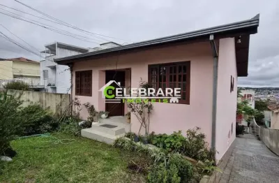 Terreno com casas para investimento no bairro alto.