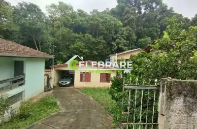 Terreno no santa cândida! com 03 casas,prox. supermercado boni