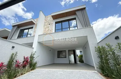 Sobrado geminado novo com 3 suítes e 2 vagas de garagem lado a lado