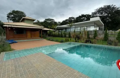 Casa com 3 dormitórios à venda, 200 m² por R$ 1.150.000,00 - Condomínio Serra dos Bandeirantes - Mário Campos/MG