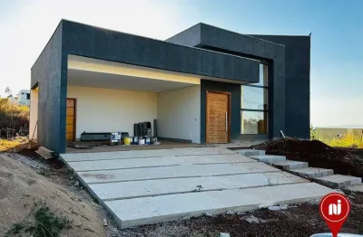 Casa com 3 dormitórios à venda, 192 m² por R$ 1.470.000,00 - Condomínio Serra dos Bandeirantes - Mário Campos/MG