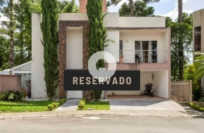 Casa ensolarada à venda - 3 suítes e terreno privativo grande em condomínio no bacacheri