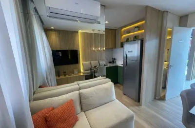 Apartamento com 02 dormitórios varanda e vaga de carro em santos com vaga
