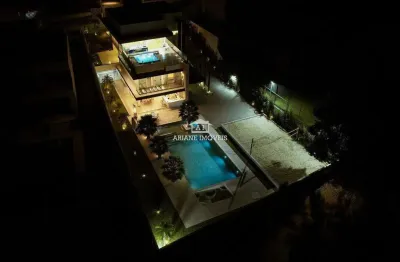 Casa 5 quartos com quadra beach tênis no aldeias do lago
