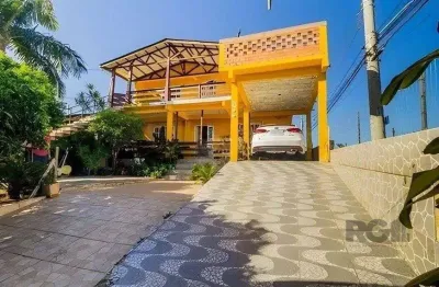 Casa de 4 dormitórios,  no bairro lomba do pinheiro