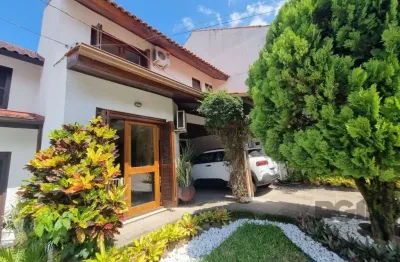 Casa em condomínio fechado com 3 quartos à venda na Avenida Eduardo Prado, 695, Cavalhada, Porto Alegre
