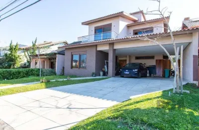 Casa em condomínio 4 dormitórios à venda belém novo porto alegre/rs