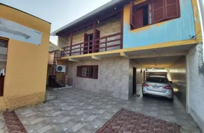 Casa com 3 quartos à venda na Rua Império, 130, Vila Nova, Porto Alegre