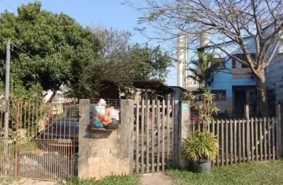 Casa com 5 quartos à venda na Rua Sete Mil e Quatro, 30, Restinga, Porto Alegre