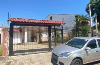 Casa 4 dormitórios i vaga 8 carros i bairro camaquã