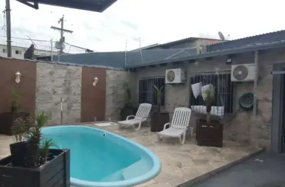 Casa no bairro restinga com piscina com 4 dormitórios