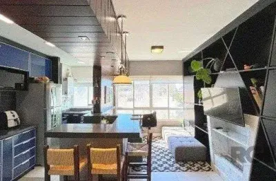 Elegante apartamento mobiliado com suíte, churrasqueira e 1 vaga no menino deus