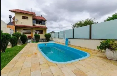 Casa com 3 quartos à venda na Rua Zeferino Dias, 390, Sarandi, Porto Alegre