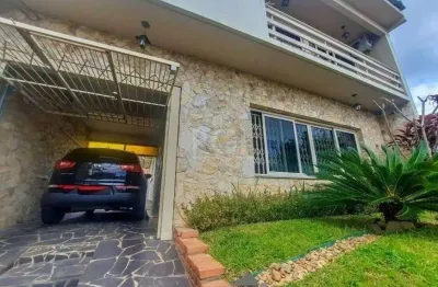 Excelente casa com 3 dormitórios e 3 vagas de garagem