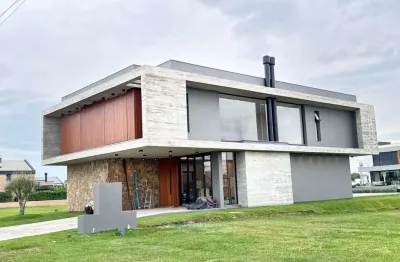 Casa beira lago, com área privativa 307,76m²/ por r$ 4.280.000 - eldorado do sul