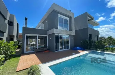 Casa em condomínio fechado com 4 quartos à venda na Rua Rio Divisa, 32, Atlântida, Xangri-Lá