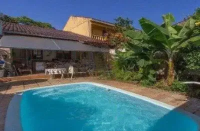 Casa com 3 quartos à venda na Rua Menezes Paredes, 256, Nonoai, Porto Alegre