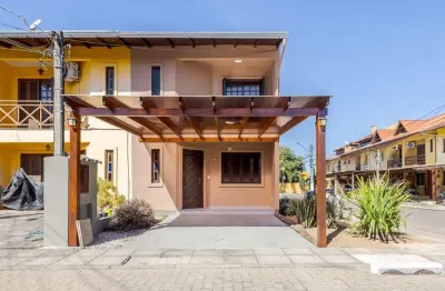 Casa em condomínio fechado com 3 quartos à venda na Avenida Edgar Pires de Castro, 1286, Hípica, Porto Alegre