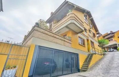 Casa com 3 quartos à venda na Rua Edgar Luiz Schneider, 54, Jardim Isabel, Porto Alegre