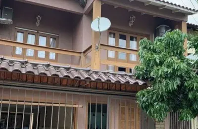 Casa com 5 quartos à venda na Rua Anhumas, 42, Jardim Algarve, Alvorada