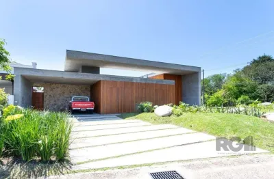 A casa le mans, uma residência térrea de esquina com 389,48m2 de área coberta