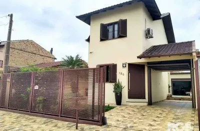 Casa com 3 quartos à venda na Rua Waldomiro Feijó, 130, Nossa Sra. De Fátima, Guaíba